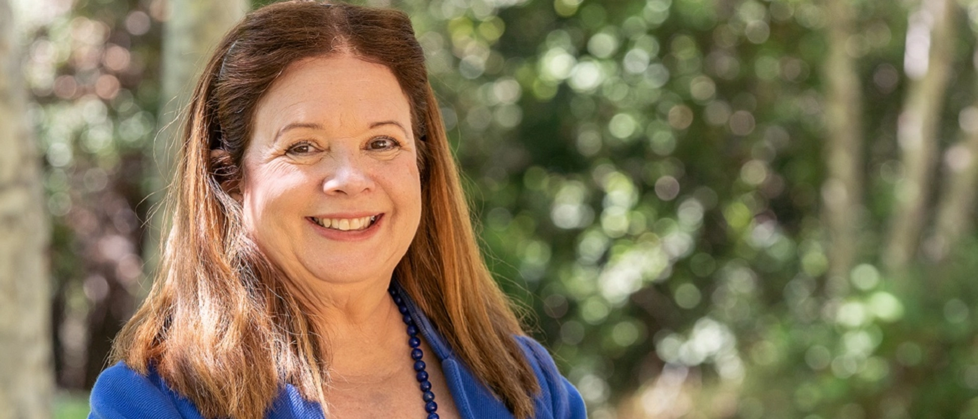 Los Angeles City Attorney Hydee Feldstein Soto standing outside and smiling.