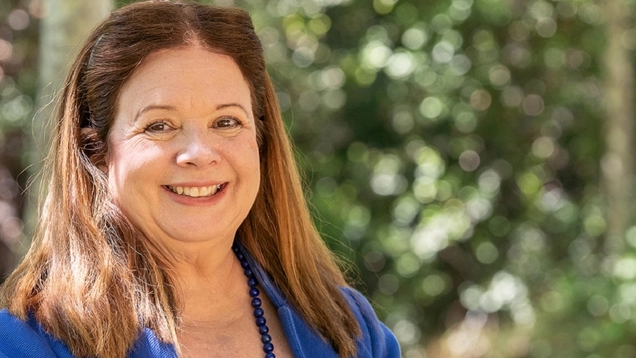 Los Angeles City Attorney Hydee Feldstein Soto standing outside and smiling.